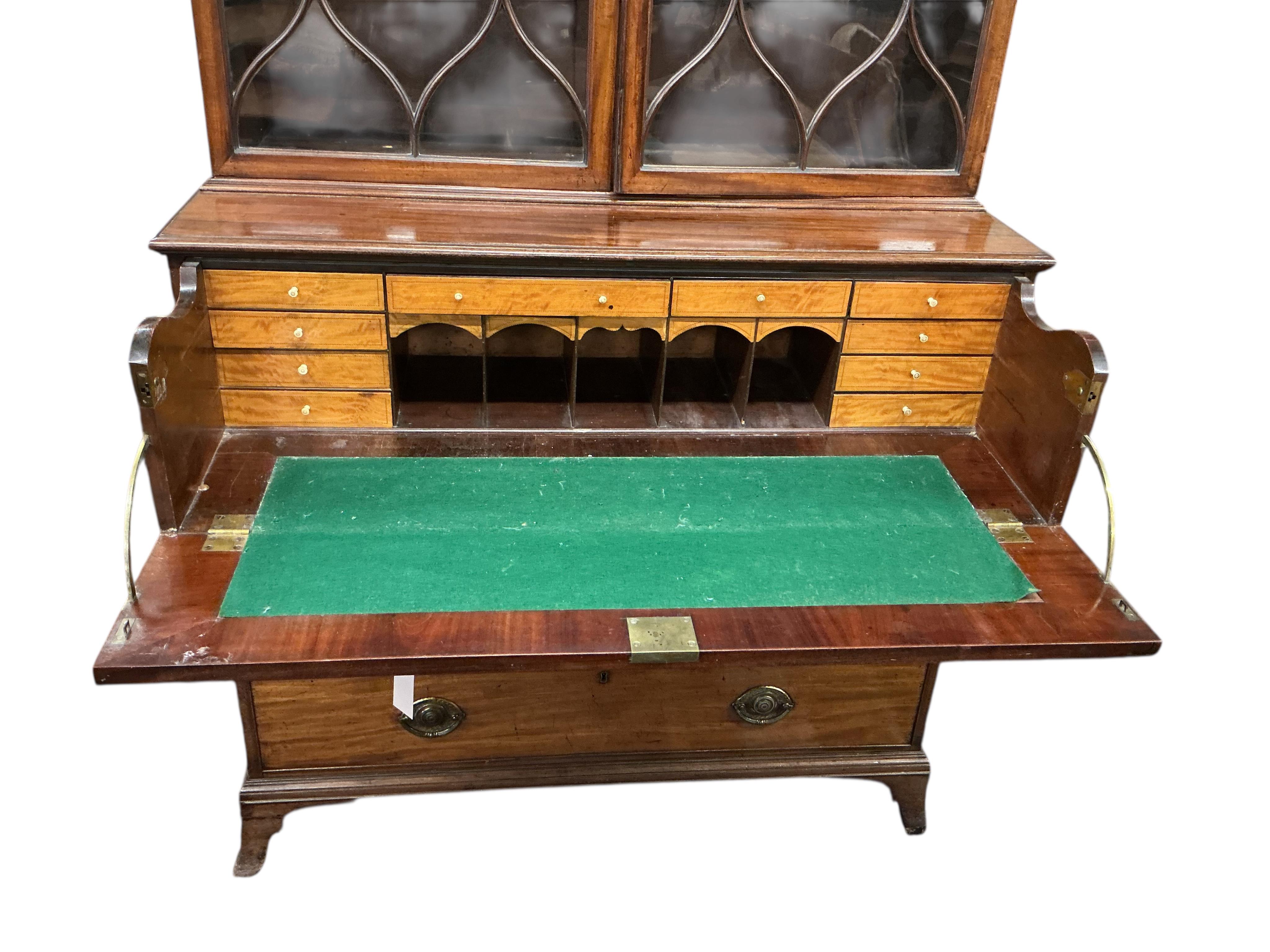 A George III mahogany secretaire bookcase, width 116cm, depth 57cm, height 234cm, one glass pane missing